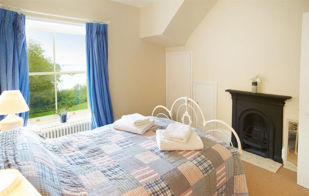 West wing double bedroom with 4’6 bed at Oak Cliff Place, Ryde
