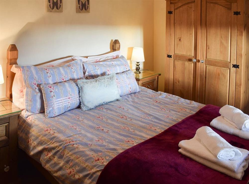 Welcoming double bedroom at Oak Cottage in Ambleside, Cumbria