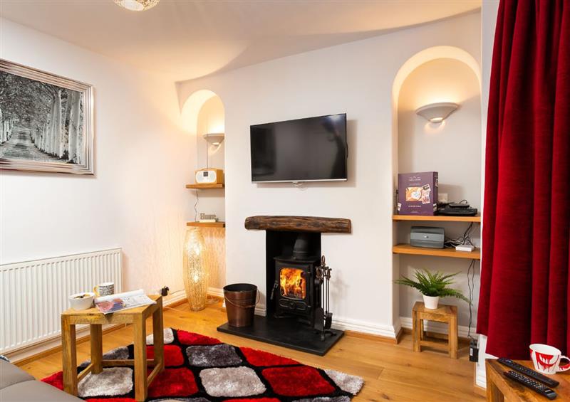 Relax in the living area at Oak Cottage, Bowness