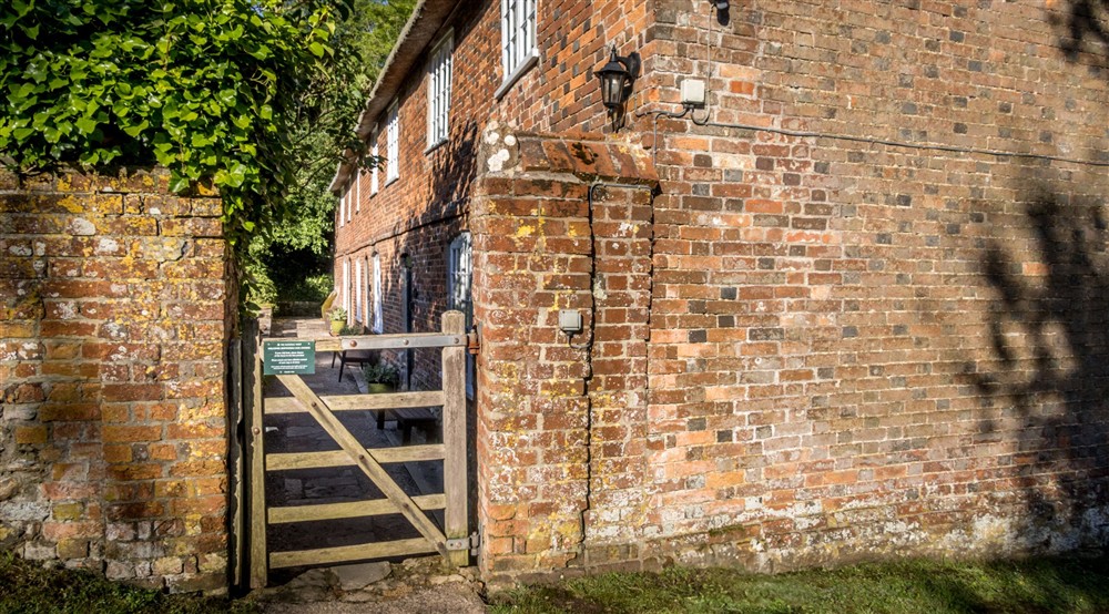 The gate leading to Oak Cottage, Dorset at Oak Cottage in Bridport, Dorset