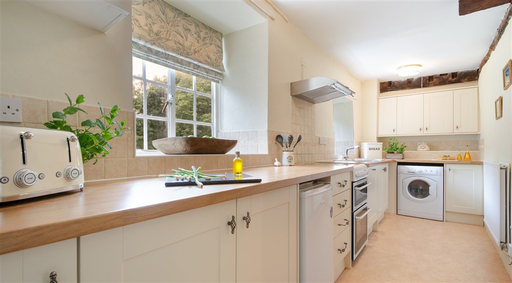The kitchen (photo 2) at Oak Cottage in Bridport, Dorset