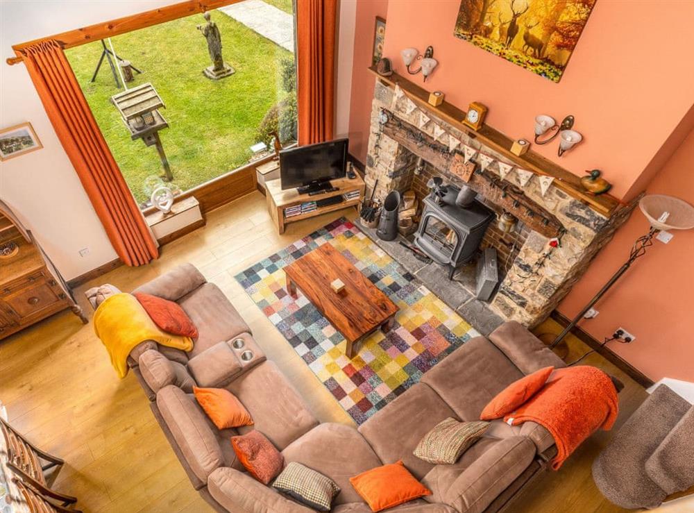 View of the living area from the gallery at Oak Cottage in Buckden, near Hawes, North Yorkshire
