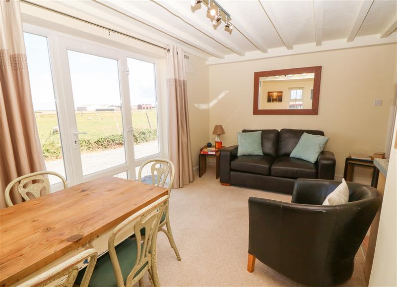 Enjoy the living room at Oak Cottage, Dinas Dinlle near Caernarfon