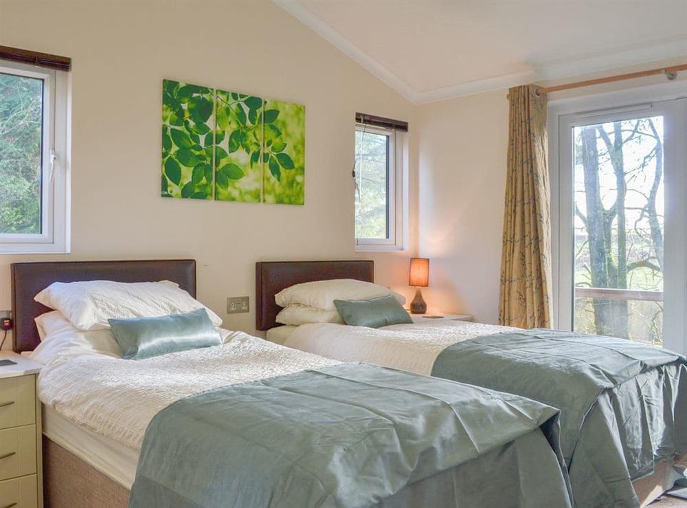 Charming and bright bedroom with superkingsize zip and link beds at Oak Lodge in Clatworthy, near Williton, Somerset