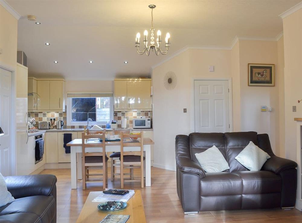 Living area through to the dining and kitchen areas at Oak Lodge in Clatworthy, near Williton, Somerset