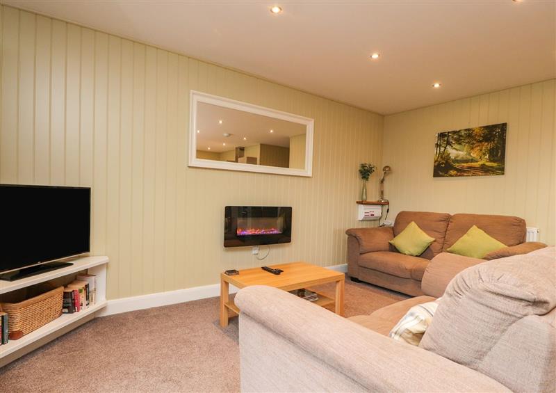 Relax in the living area at Oak Lodge, Goosnargh
