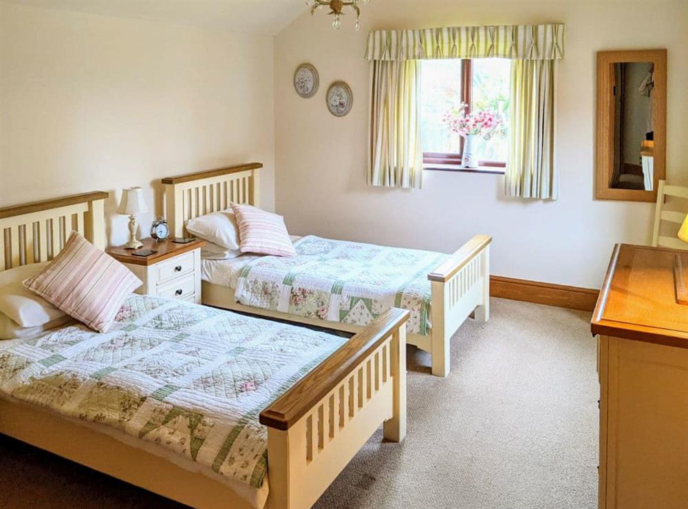 Twin bedroom at Oak Tree Barn in Wymondham, near Norwich, Norfolk