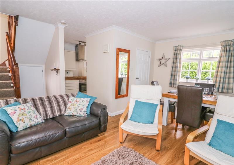 Relax in the living area at Oak Tree Cottage, Aberporth