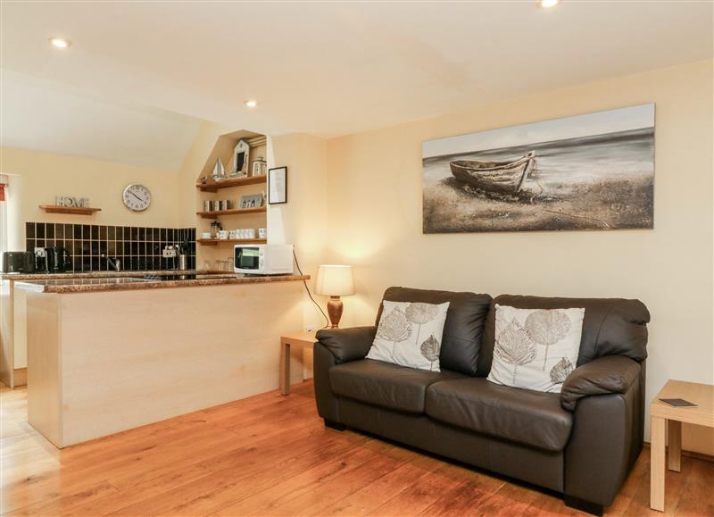 Relax in the living area at Oak Tree Cottage, Broadwoodkelly near Winkleigh