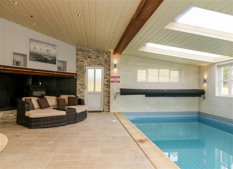 The swimming pool at Oak Tree Cottage, Broadwoodkelly near Winkleigh