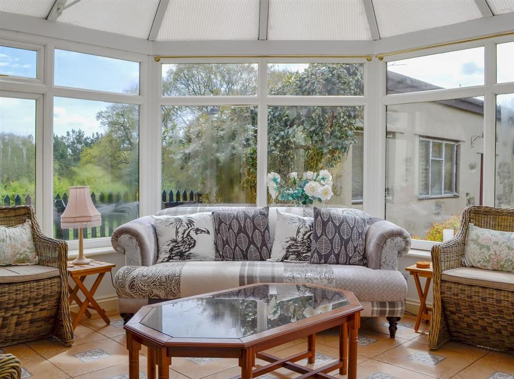 Light and airy conservatory at Oak Tree Cottage in Drybrook, Gloucestershire