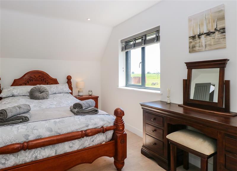 One of the 3 bedrooms at Oak Tree House, 1 Homestead Gardens, Filby