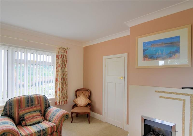 Relax in the living area at Oak Tree, Lyme Regis