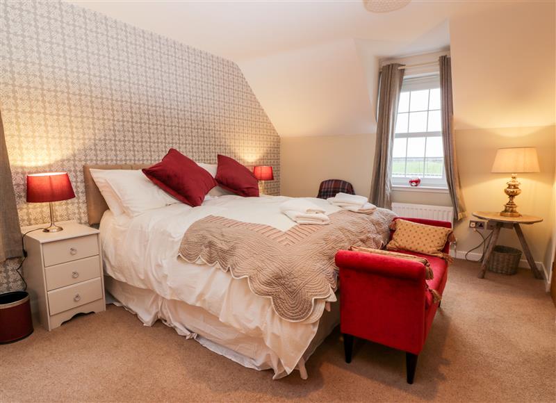 This is a bedroom (photo 2) at Oakbank, Carrutherstown near Annan