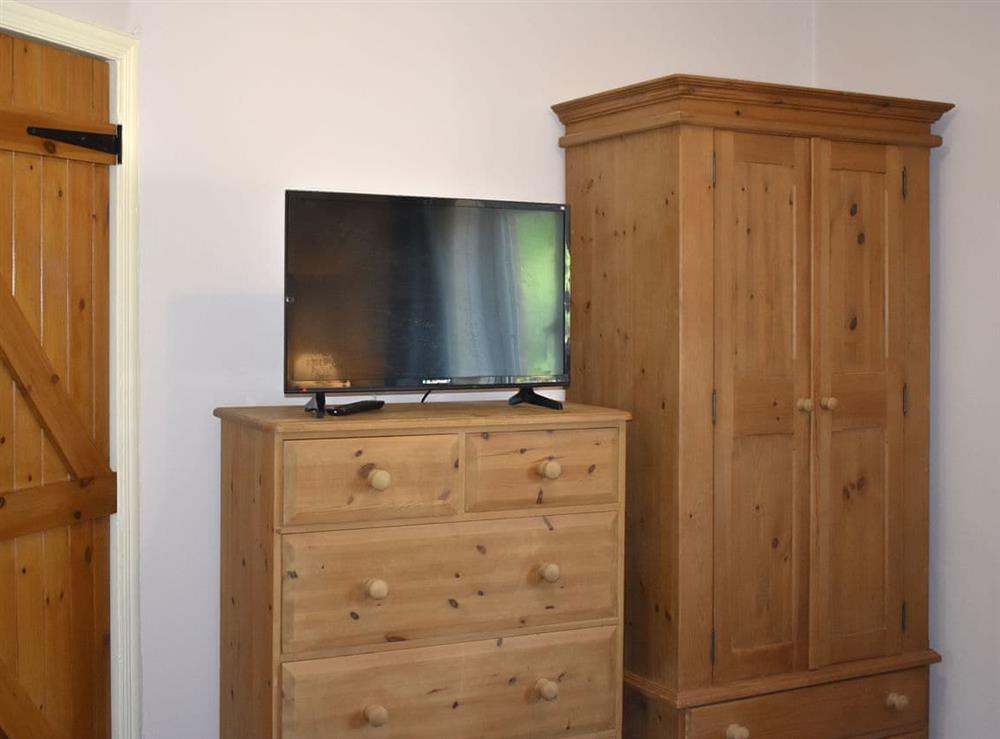 Ample storage within twin bedroom at Oakdene Lodge in Wimborne, Dorset
