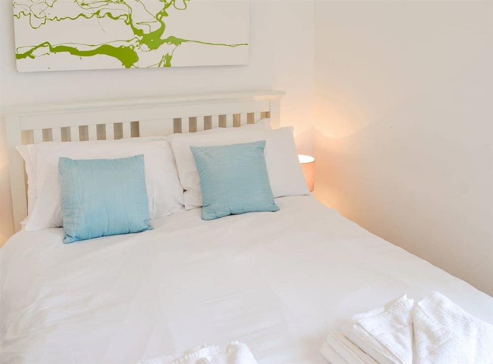 The light and airy double bedroom at Oaken Cottage in Mousehole, Penzance, Cornwall., Great Britain