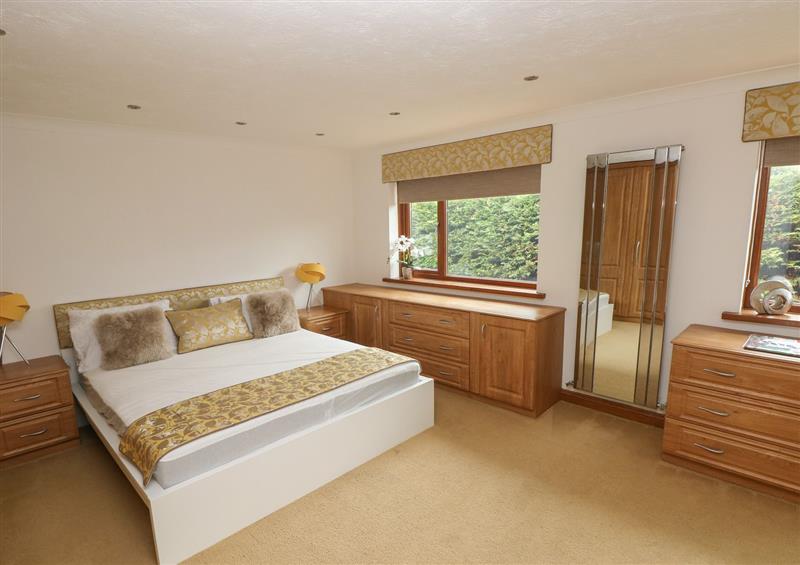 A bedroom in Oakland Cottage at Oakland Cottage, Summerhill near Saundersfoot