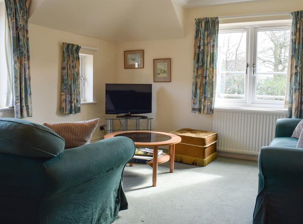 Comfortable living/ dining room at Oaklands in Ambleside, Cumbria