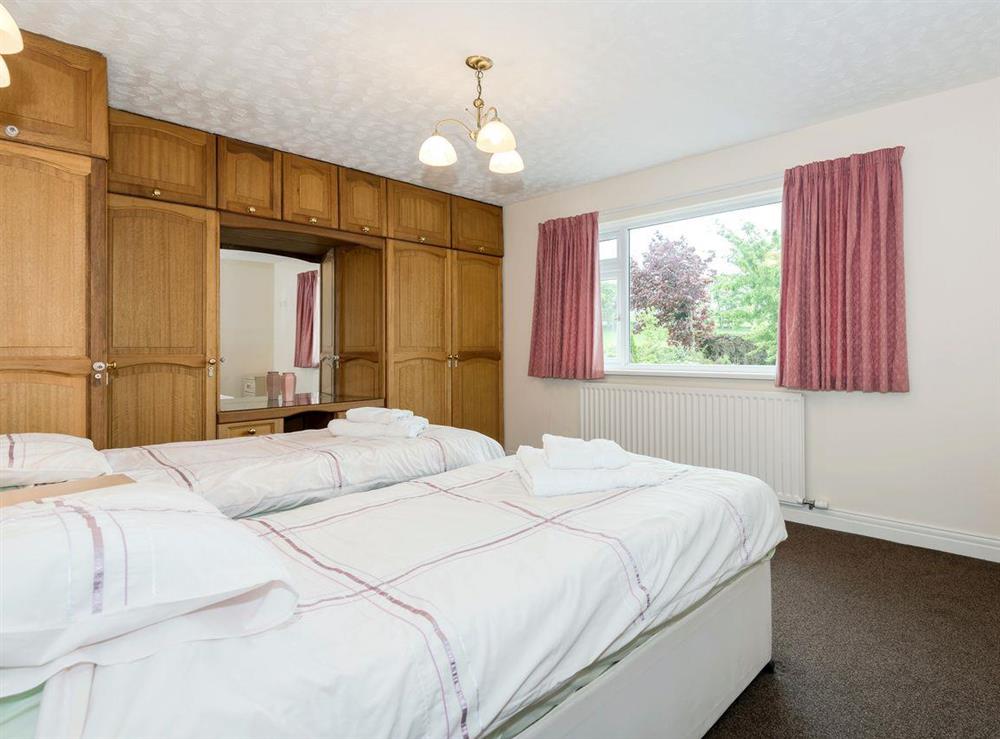 Large twin bedroom at Oaklands in Langrigg, near Cockermouth, Cumbria