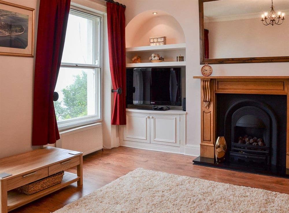 Lovely spacious living room with open fireplace at Oaklands View in Scarborough, North Yorkshire