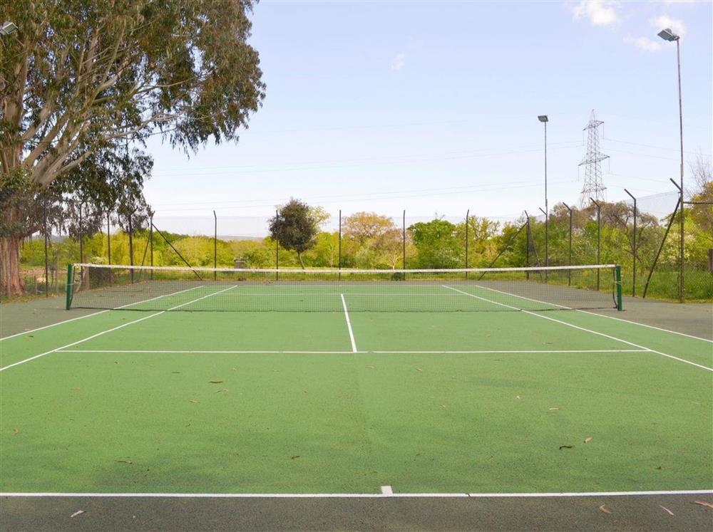 The shared on-site tennis court