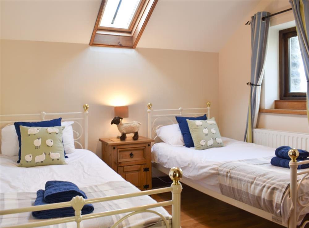 Twin bedroom at Oaktree Cottage in Near Tebay, Cumbria