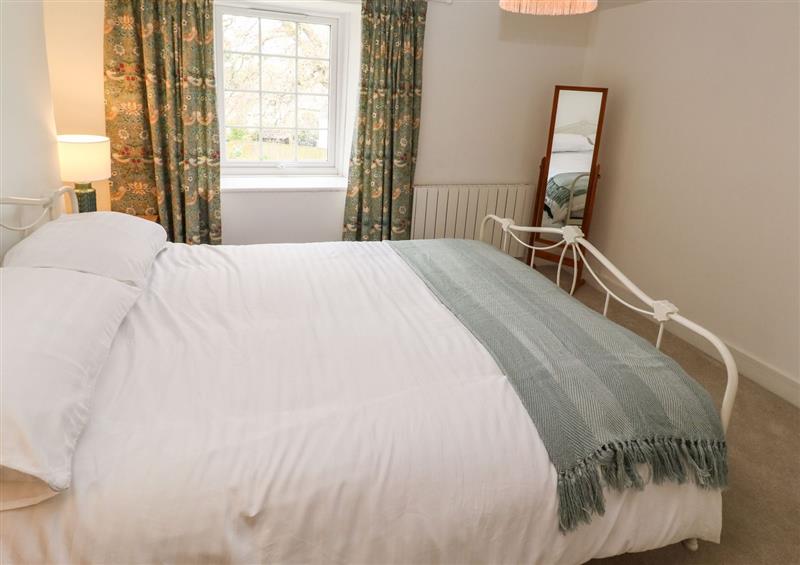 A bedroom in Oaktree Cottage at Oaktree Cottage, St Austell