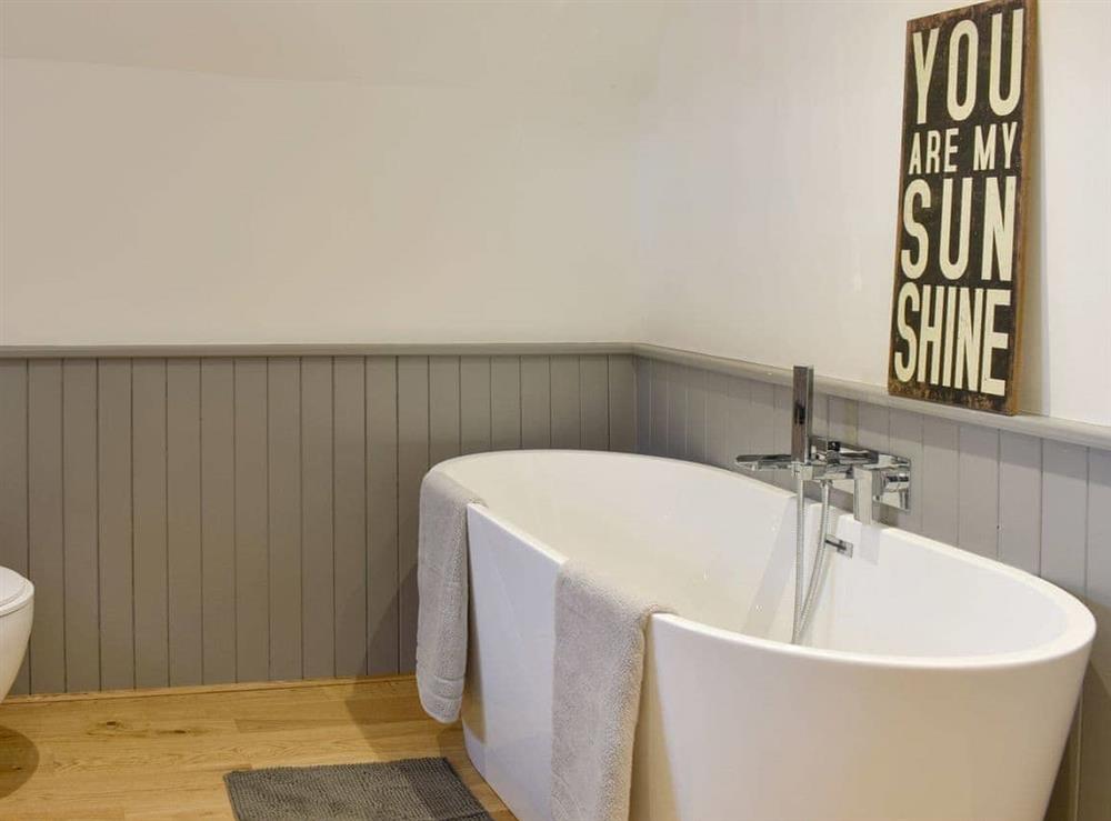 Family bathroom with bath and separate shower cubicle at Oasis in Bradwell-on-Sea, Essex