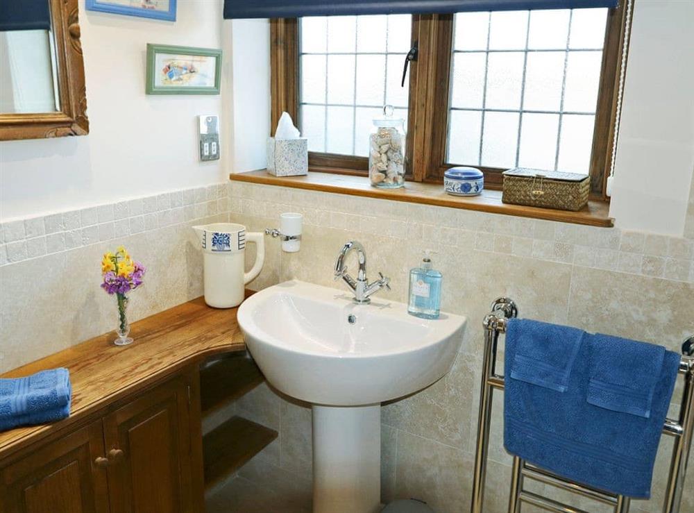 Bathroom with shower over bath (photo 2) at Oast Cottage in Herstmonceux, near Hailsham, East Sussex