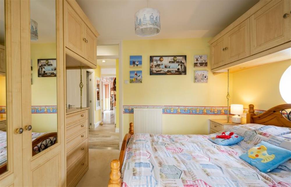 Ground floor: Double bedroom with en-suite shower room at Ocean Drive, Heacham near Kings Lynn