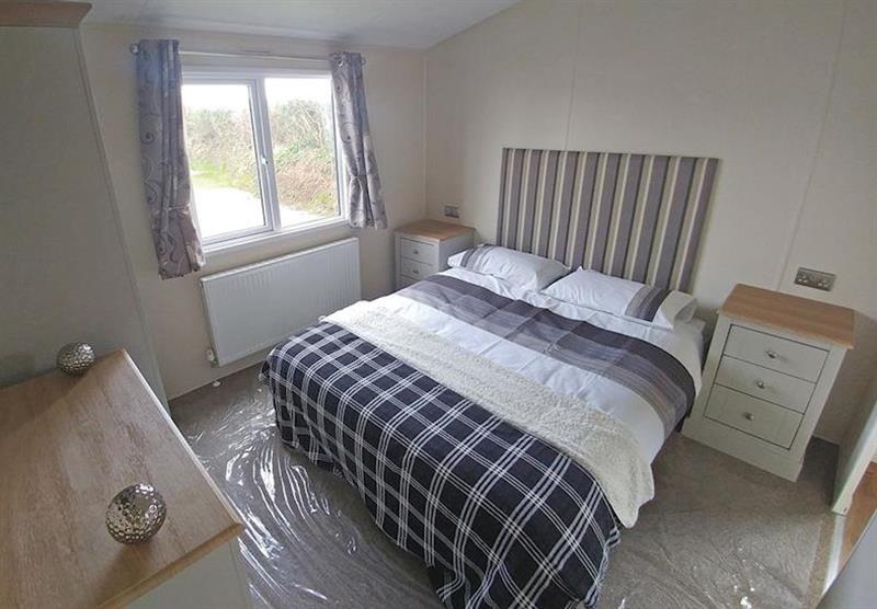 Double bedroom in a Platinum Lodge 16 at Ocean Heights Leisure Park in New Quay, Mid Wales