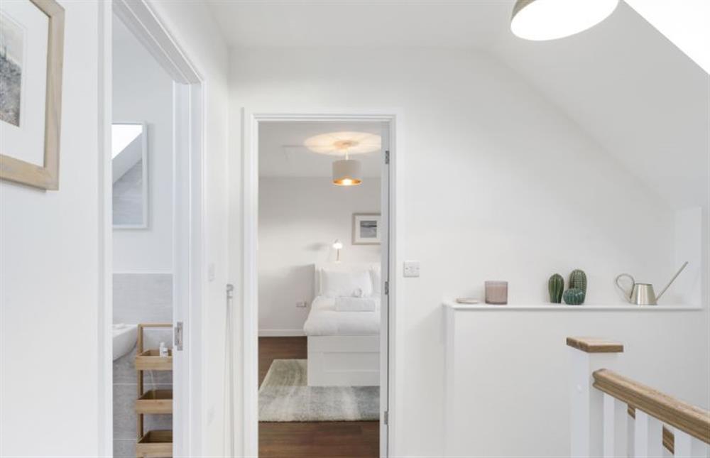Ocean Heights, Porthtowan. First floor landing with access to Bedroom two, three and shared bathroom at Ocean Heights, Porthtowan 