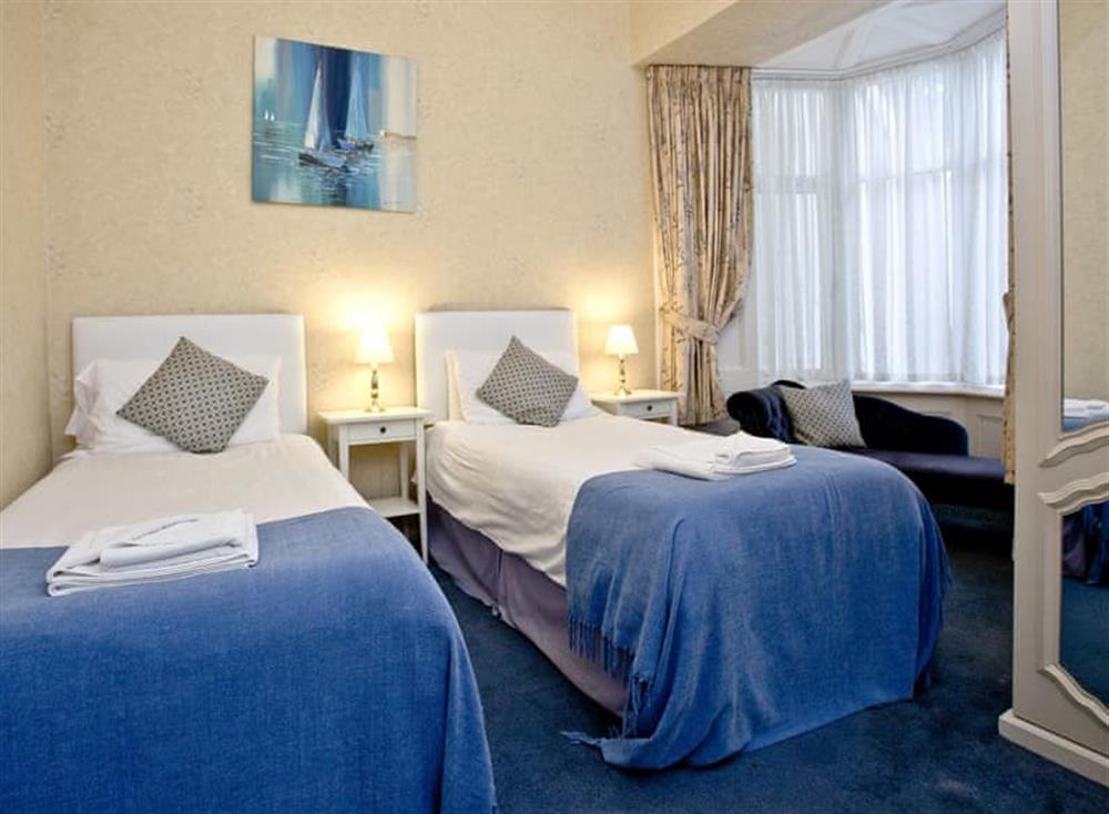 Twin bedroom at Ocean Shangri-La, Bay Fort Mansions in Torquay, South Devon