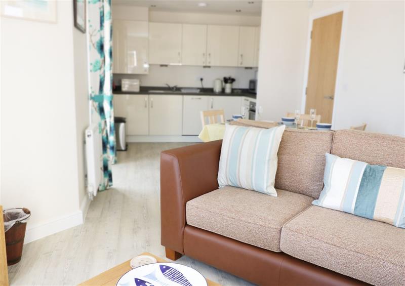 This is the living room at Ocean View Apartment, Rhos-On-Sea