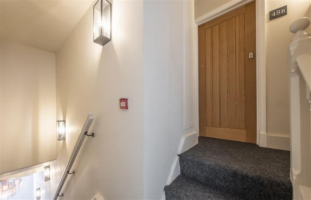 Access the apartment via the main entrance and flight of stairs at Ocean View, Hunstanton