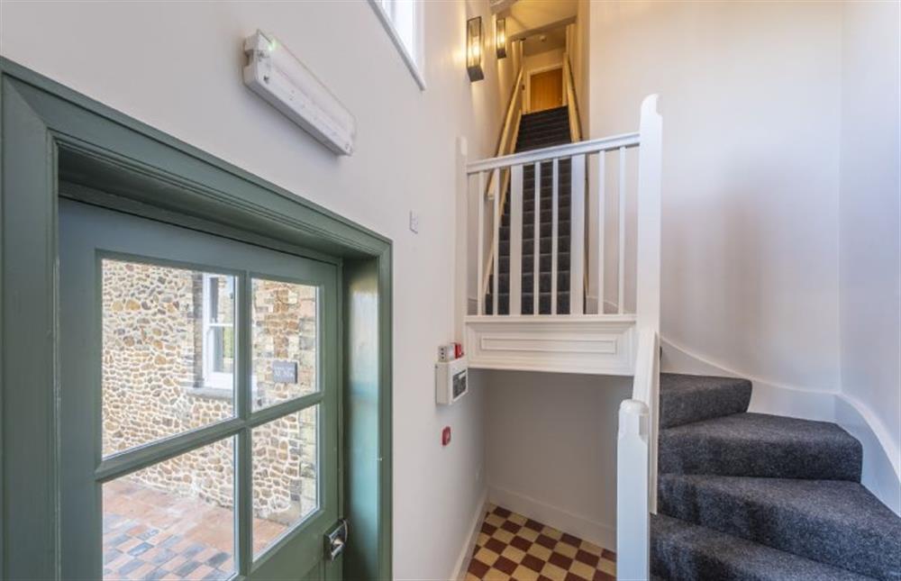 Access to the apartment is via main hallway area and flight of stairs at Ocean View, Hunstanton