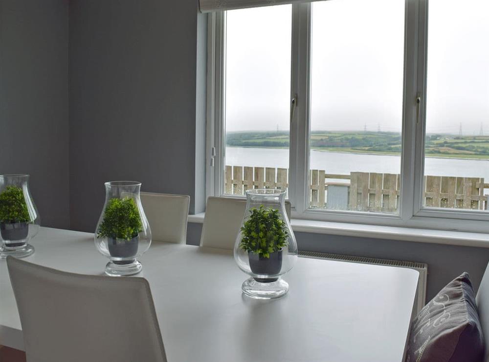 Inviting dining area with amazing views at Ocean View in Pennar, near Pembroke, Dyfed