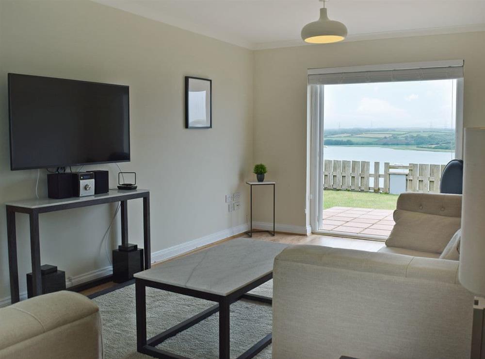 Welcoming living room with fantastic sea views at Ocean View in Pennar, near Pembroke, Dyfed