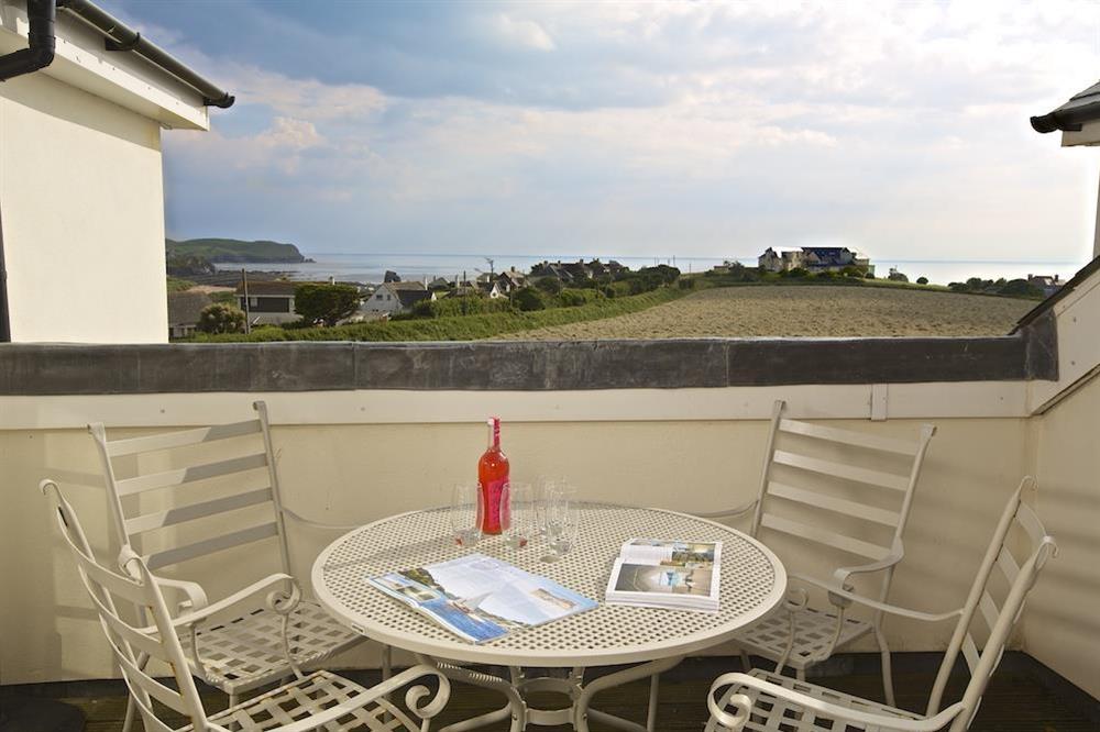 Enjoy drinks on the roof top terrace, with views towards the sea at Oceanview Apartment in Thurlestone, Nr Kingsbridge
