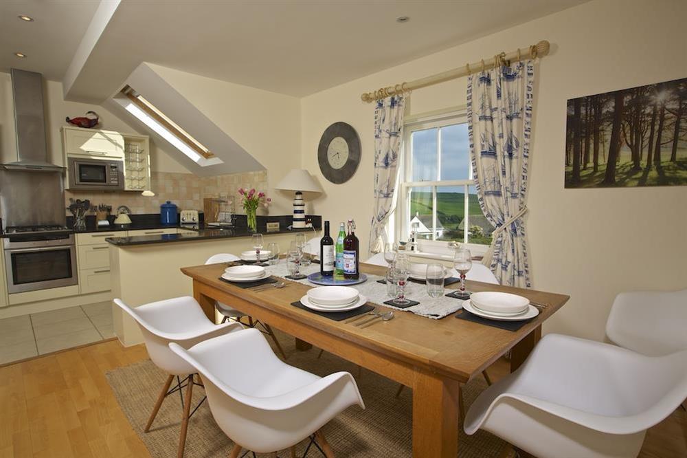 Open plan kitchen with dining area at Oceanview Apartment in Thurlestone, Nr Kingsbridge
