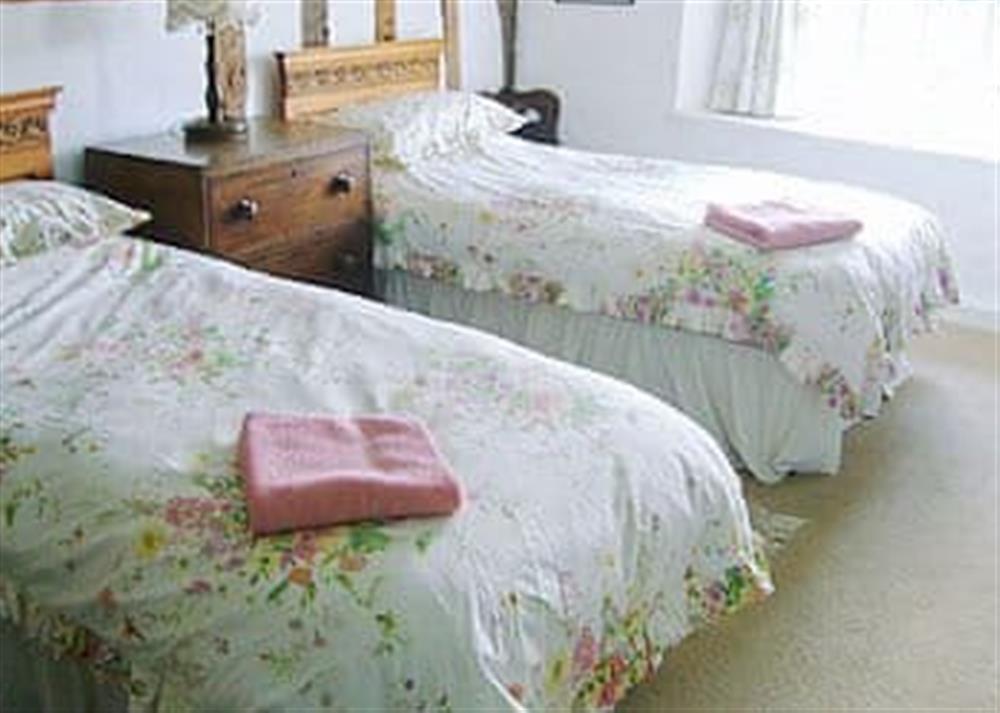 Twin bedroom at Oddwell Cottage in Brompton Ralph, near Wiveliscombe, Somerset