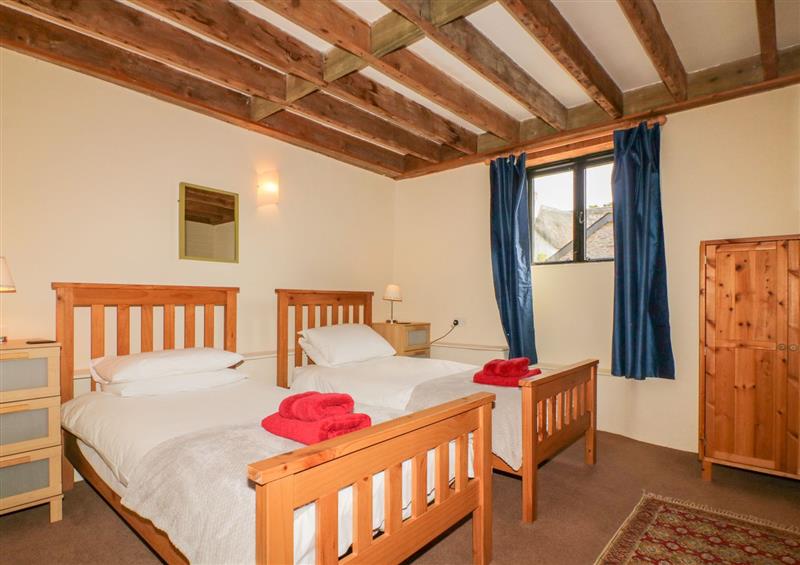 Twin bedroom at Ohope Barn, Ringmore, Devon