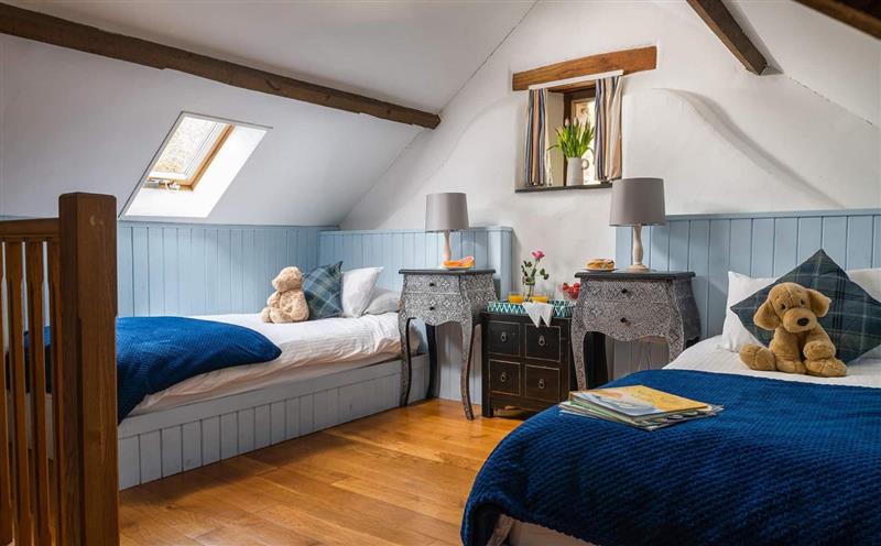A bedroom in Old Barn at Old Barn, Combe Martin