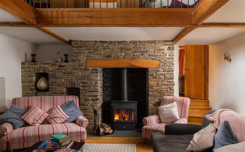 Relax in the living area at Old Barn, Combe Martin