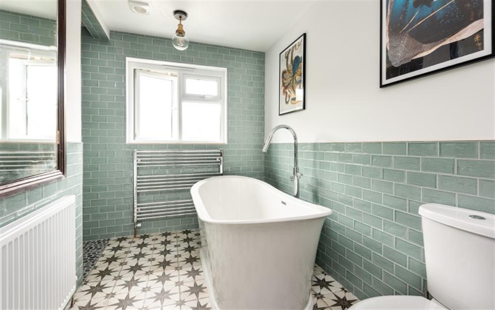 The perfect bathroom for a relaxing bath with a view. at Old Barn Cottage in Newton Ferrers