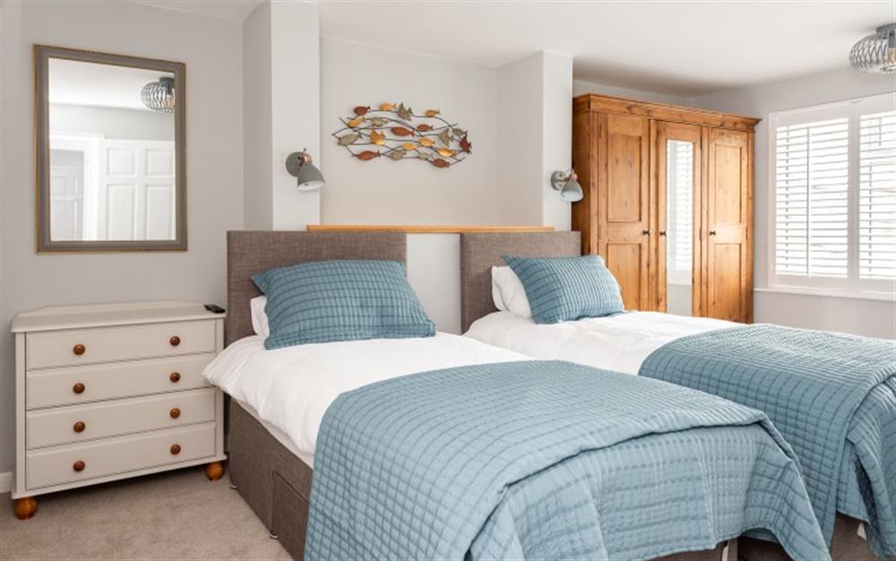 Twin bedroom  - WHICH HAS AN ADDITIONAL TRUCKLE BED at Old Barn Cottage in Newton Ferrers