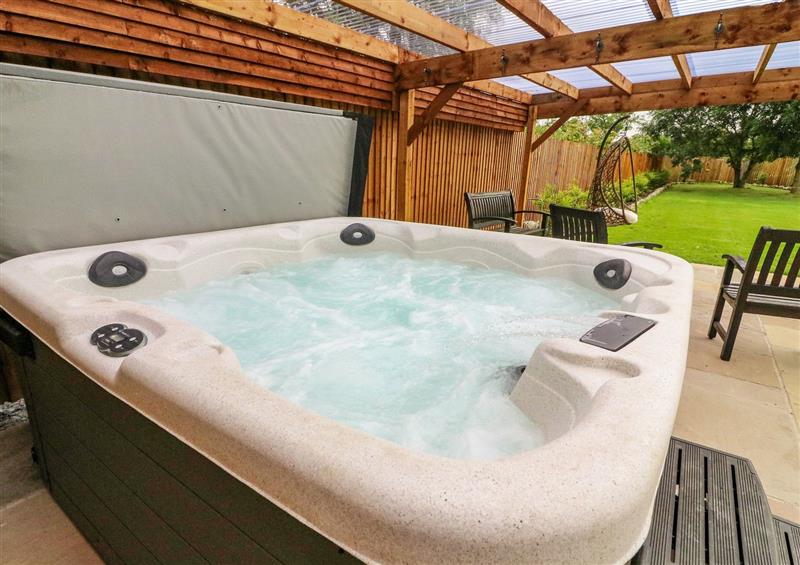 Relax in the hot tub at Old Bell Works, Pilling