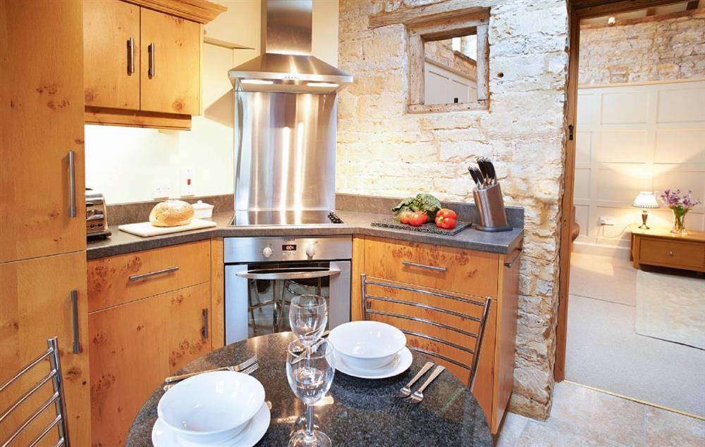 Kitchen with dining table at Old Bothy, Halford