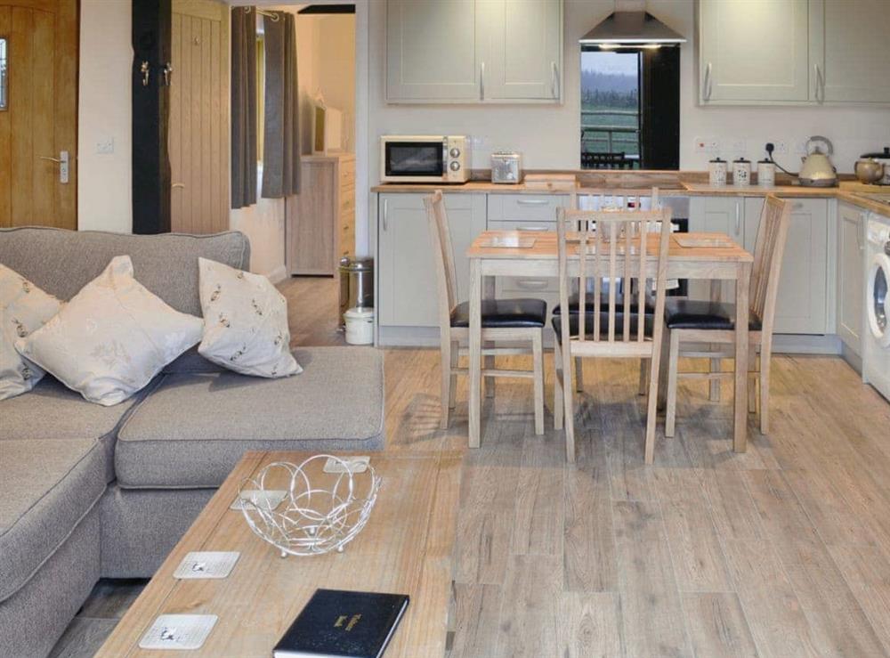 Spacious and well presented open plan living space at Dairy Cottage, 