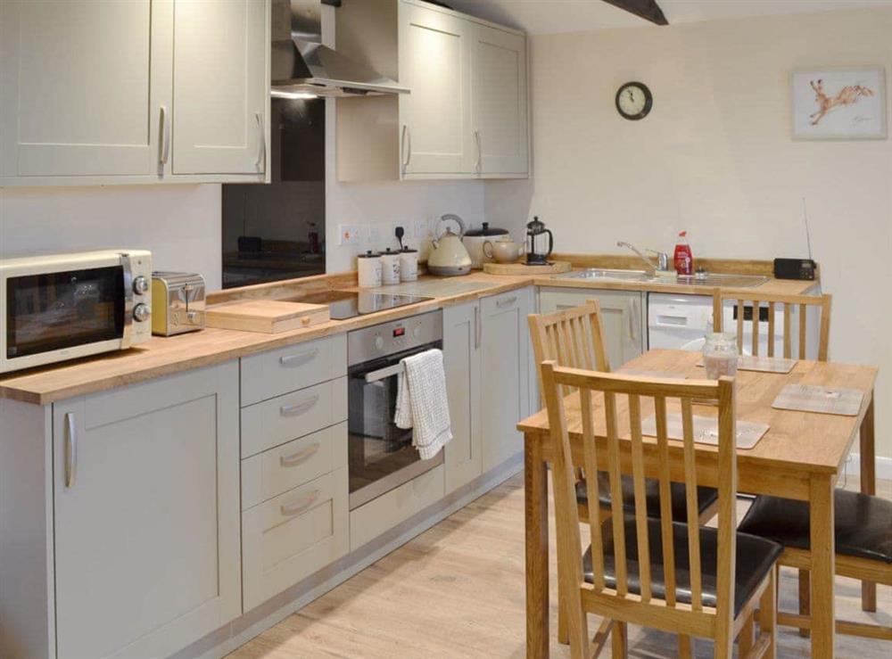 Well equipped kitchen/ dining area at Dairy Cottage, 